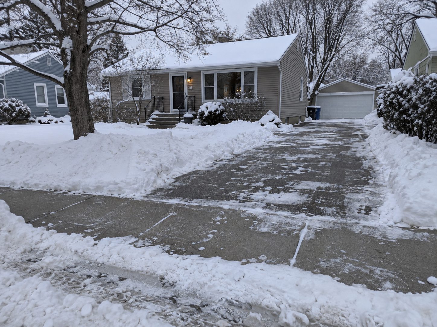 Driveway and sidewalk cleared after snowfall